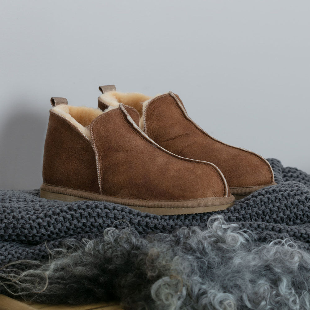 Shepherd of Sweden Sheepskin Slippers Annie Boot in Cognac brown Seen here as a pair. Available to buy from our UK independent store. 