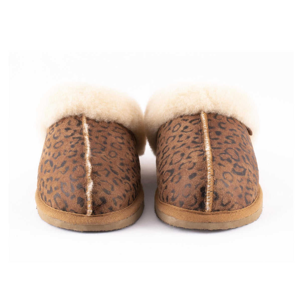 Shepherd of Sweden Sheepskin Slippers in leopard print. Available to buy from our UK independent store.  Photographed as a pair