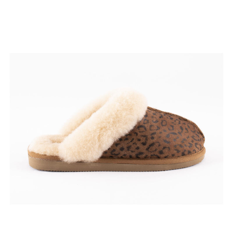 Shepherd of Sweden Sheepskin Slippers in leopard print. Available to buy from our UK independent store Seen as a single slipper here